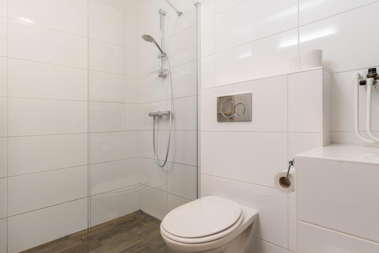 Appartement De Jutter, Resort Amelander Kaap ฮอลลุม ภายนอก รูปภาพ
